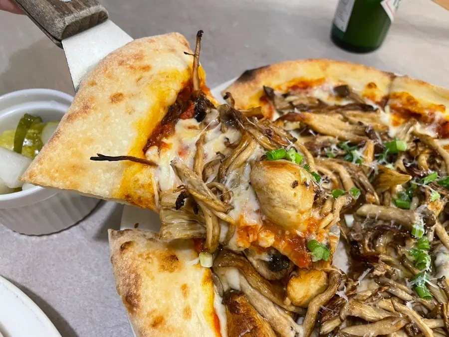 Truffle mushroom pizza topped with mushrooms
