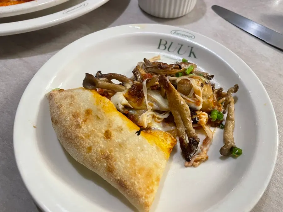 Slice of truffle mushroom pizza