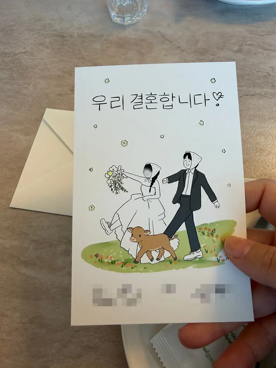 A friend's wedding invitation placed on the table