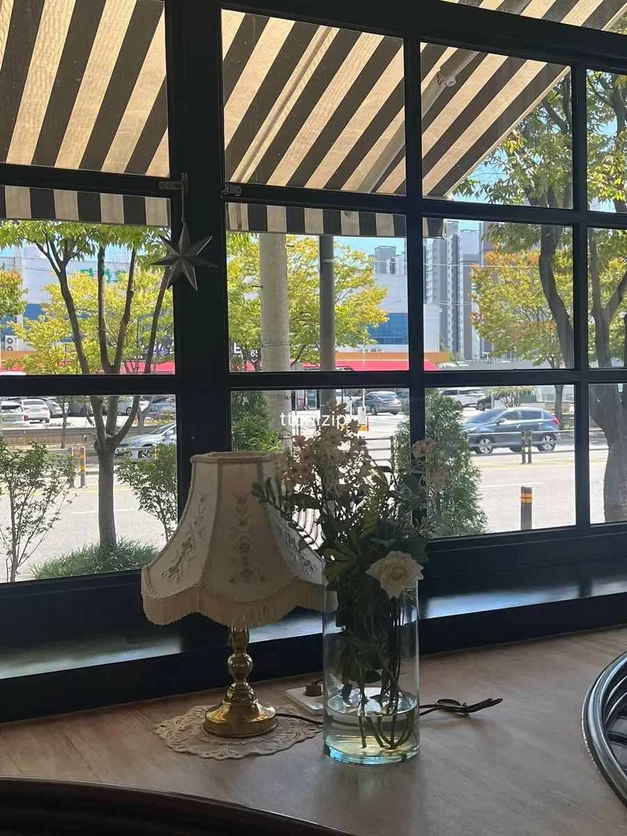 Decor inside Bueokgan Sangmu Branch evoking a European village