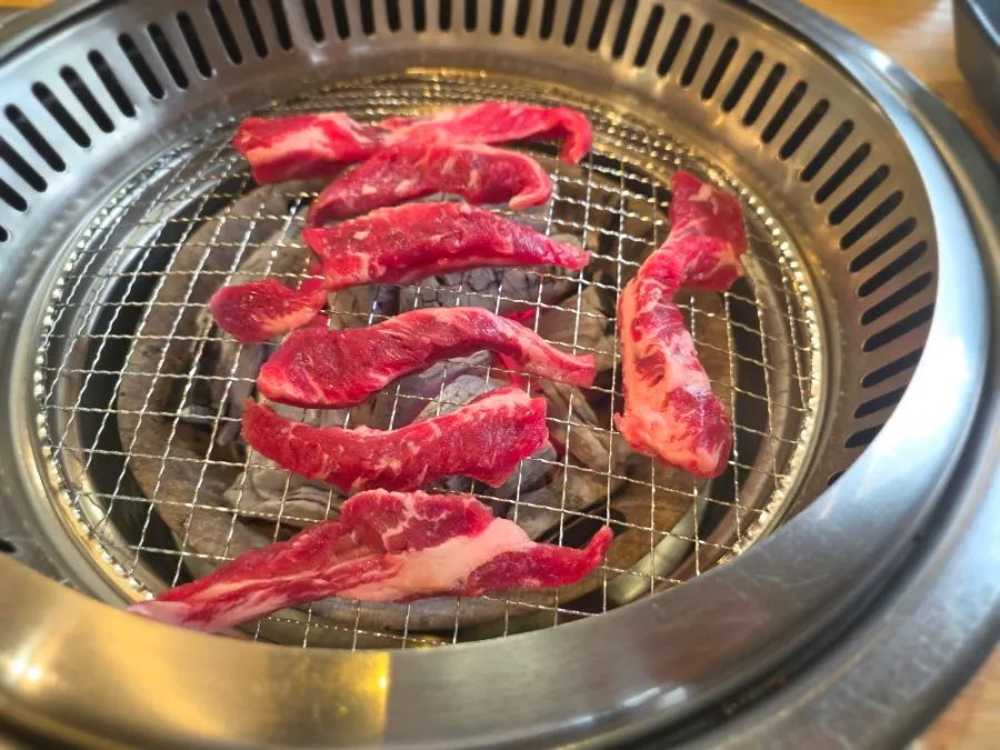 Beef rib meat over charcoal
