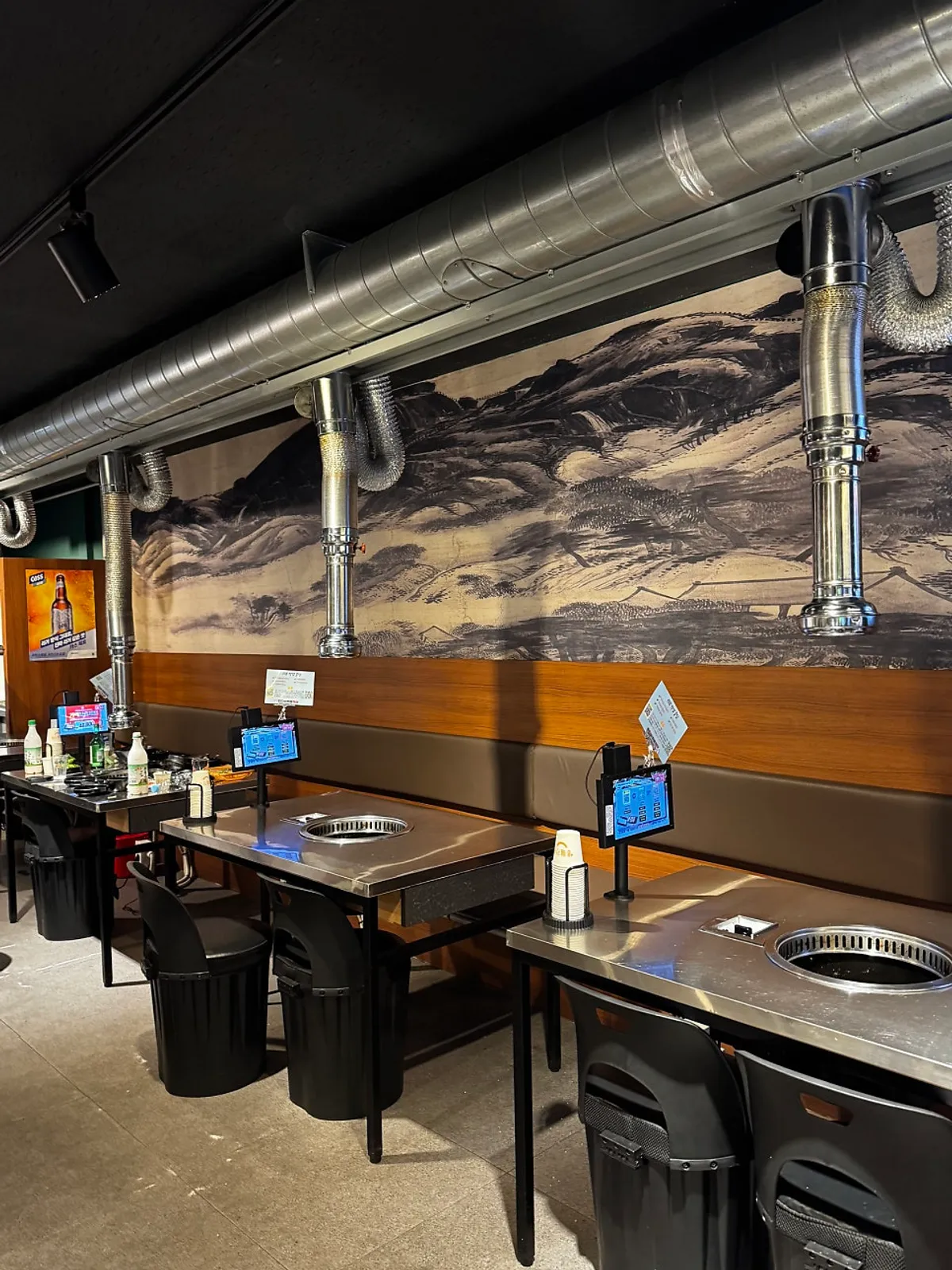 Eel restaurant interior with wide spacing between tables