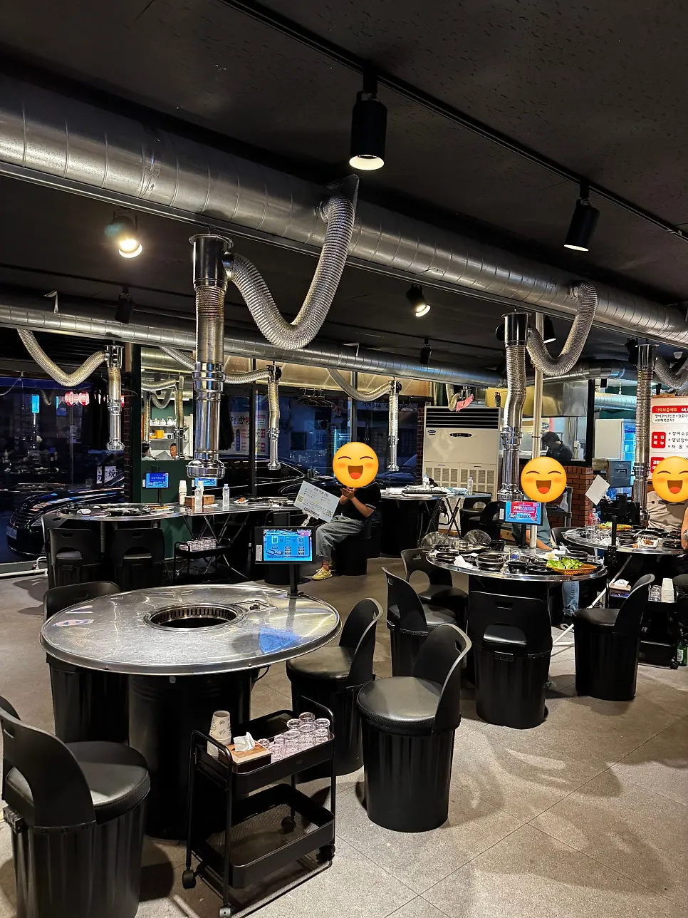 Eel restaurant interior with wide spacing between tables