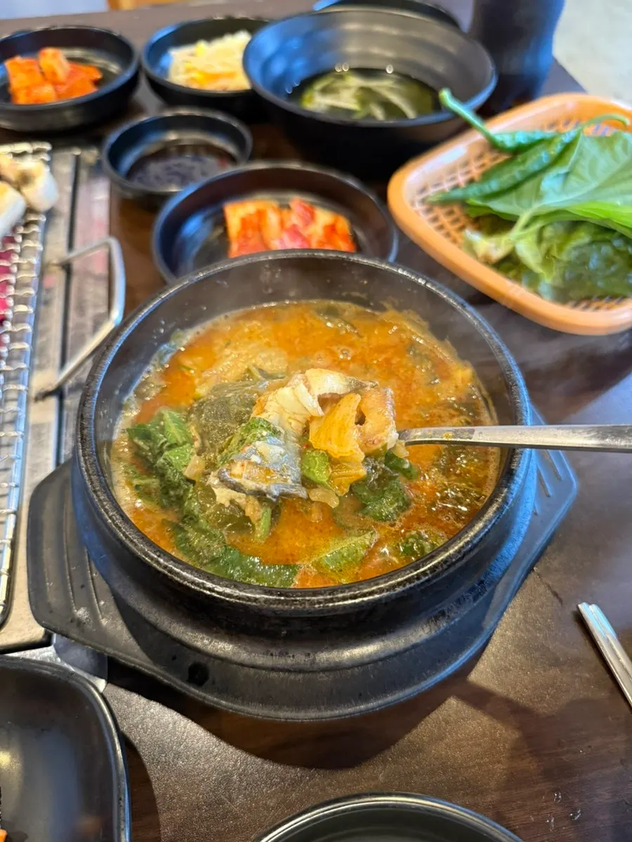 Dessert eel soup served with a bowl of rice