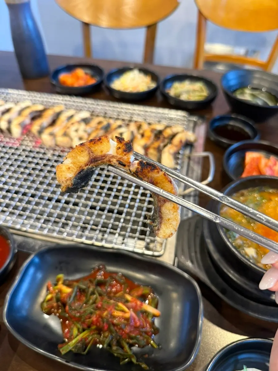 A piece of freshwater eel dipped in sauce