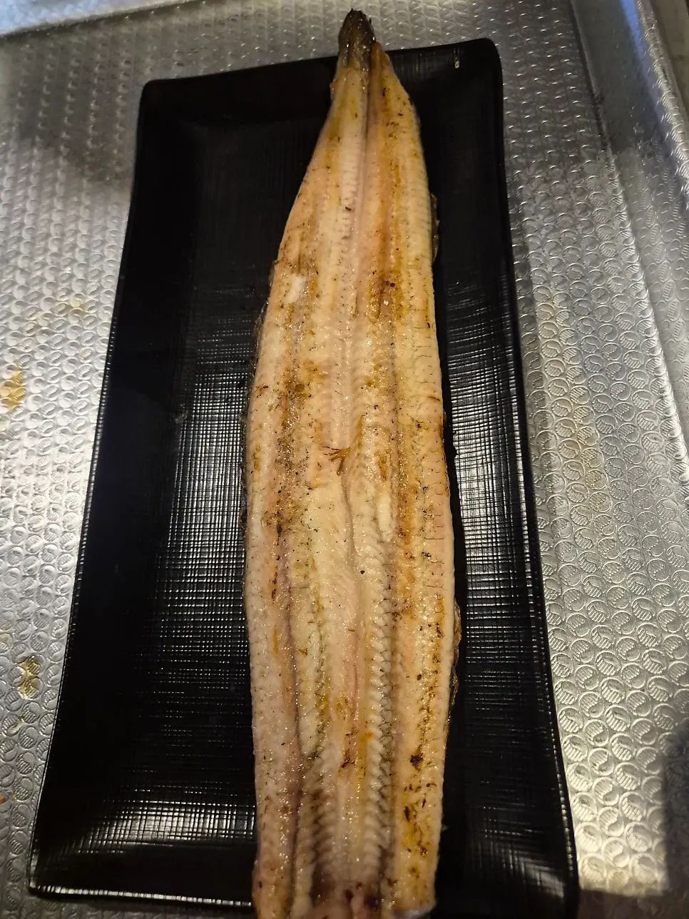Special salt-grilled eel on the grill