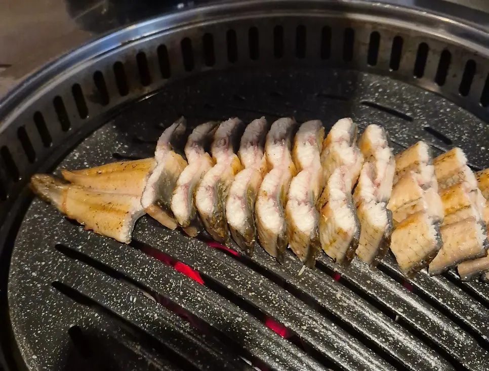 Charcoal deodeok and eel on the grill