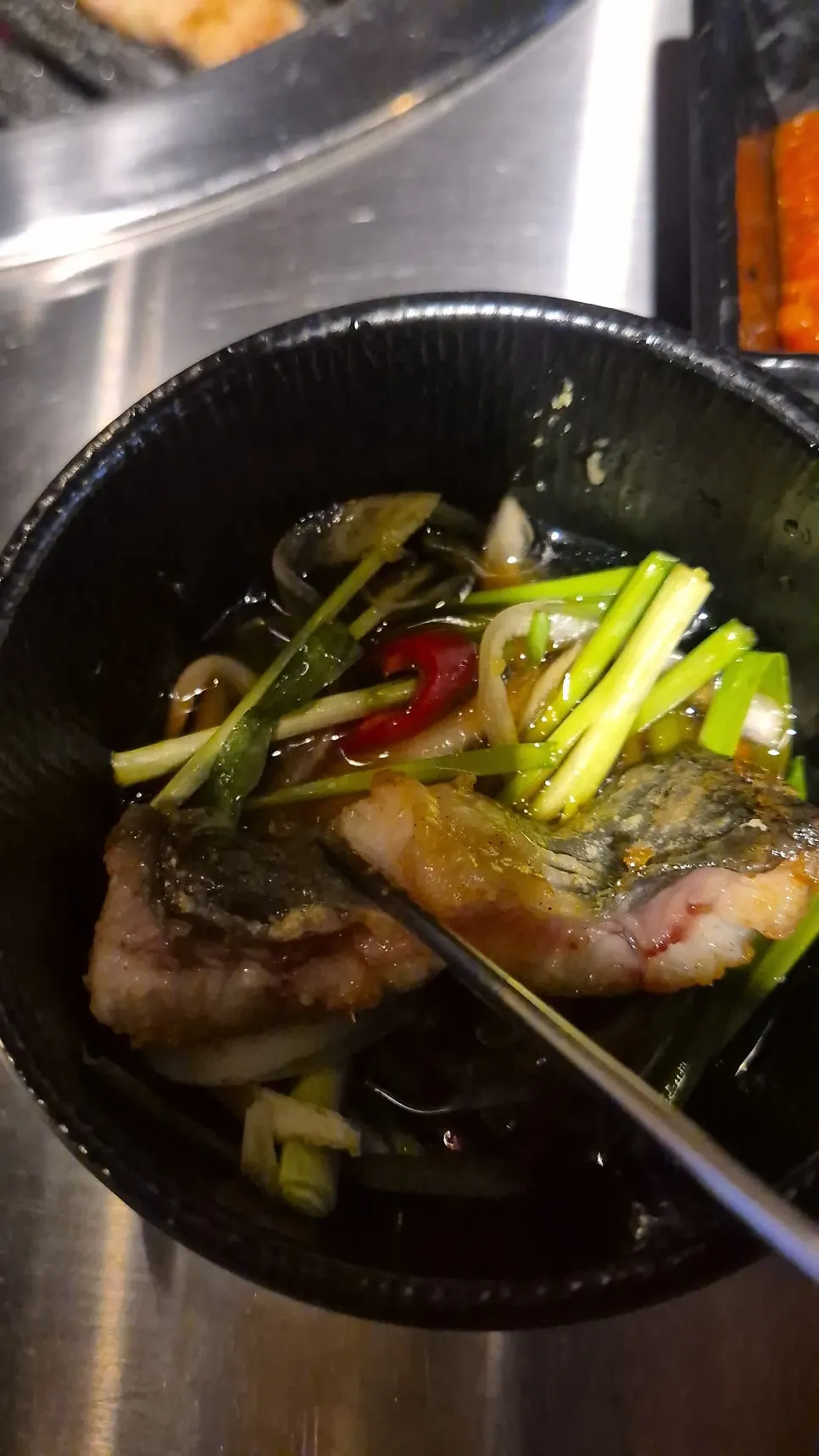 Eel dipped in chive-onion soy sauce