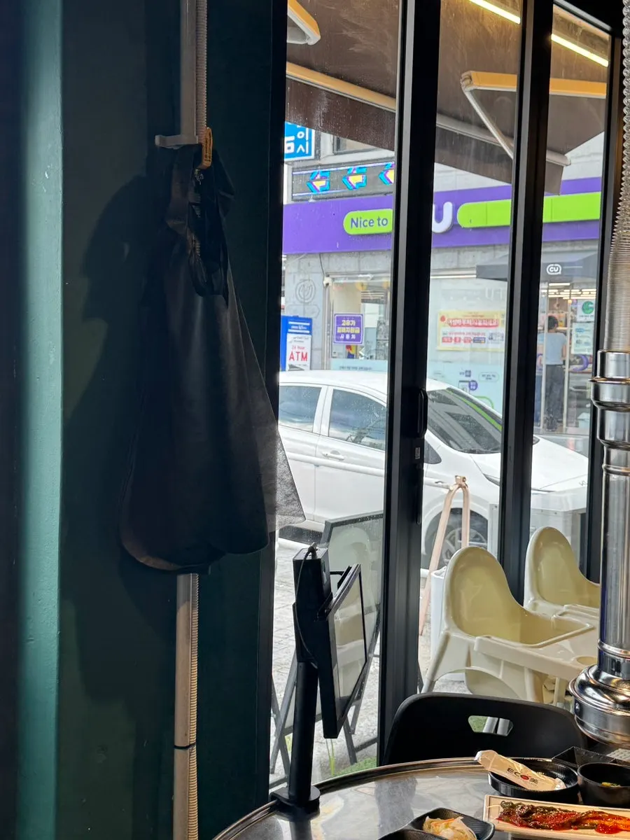 Aprons and a high chair set up at the restaurant