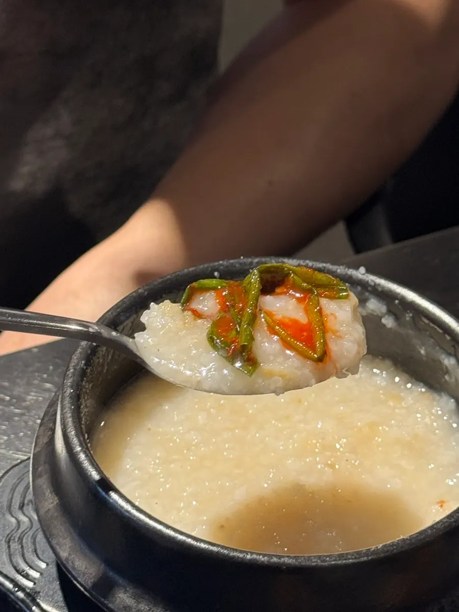 Scorched rice served in a stone pot