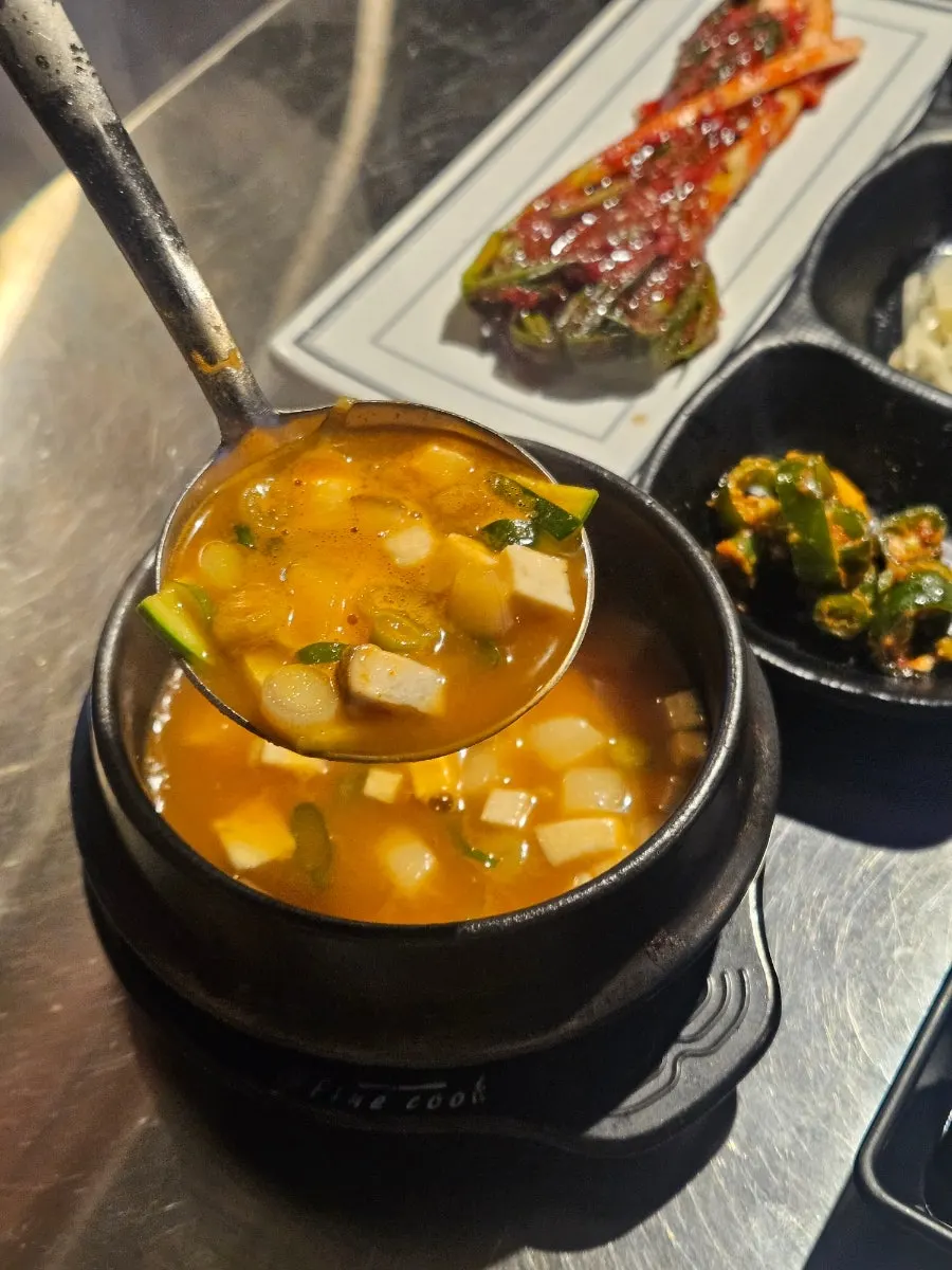 Side dishes laid out on the table after ordering eel