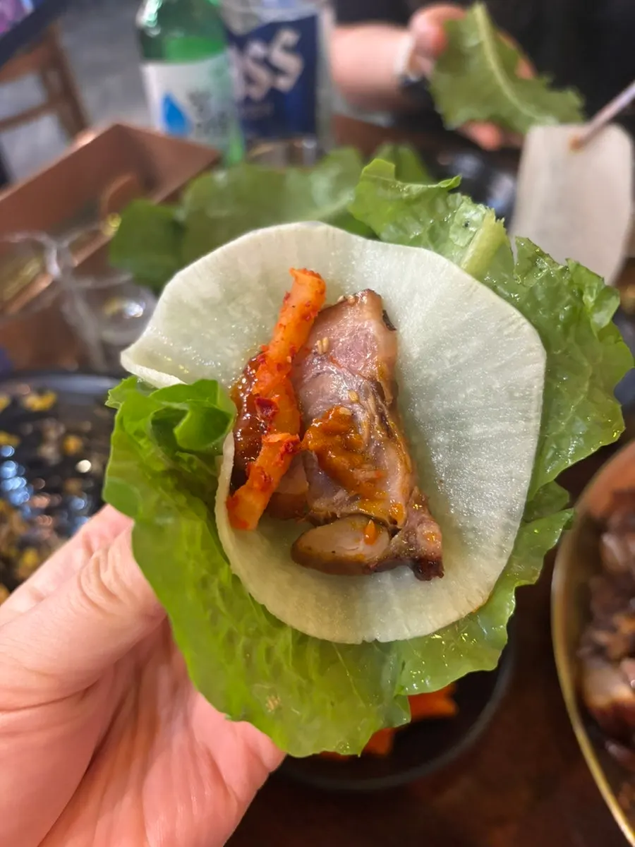 Half-and-half jjokbal with spicy and plain jjokbal served together