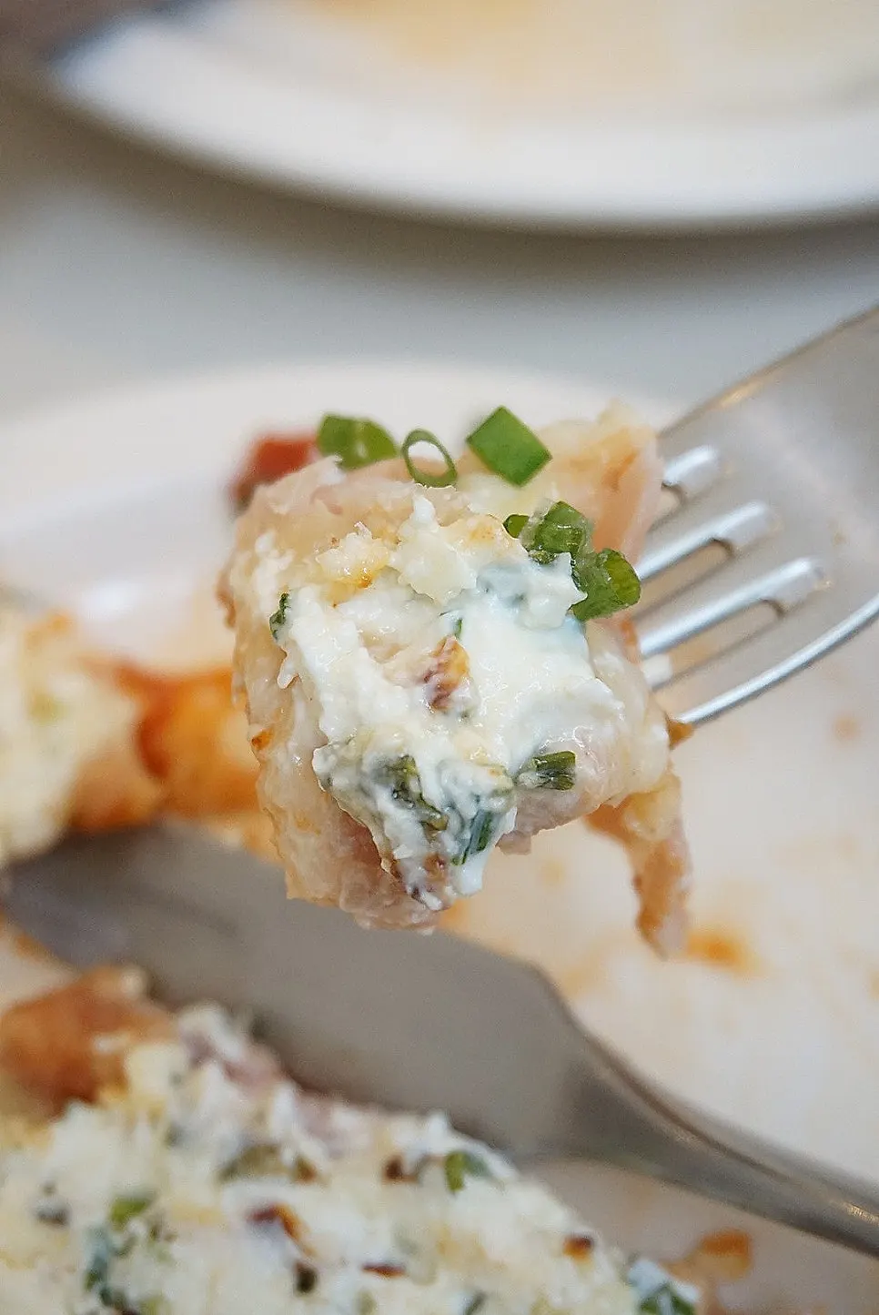 A slice of the Pemanong Jambon pizza