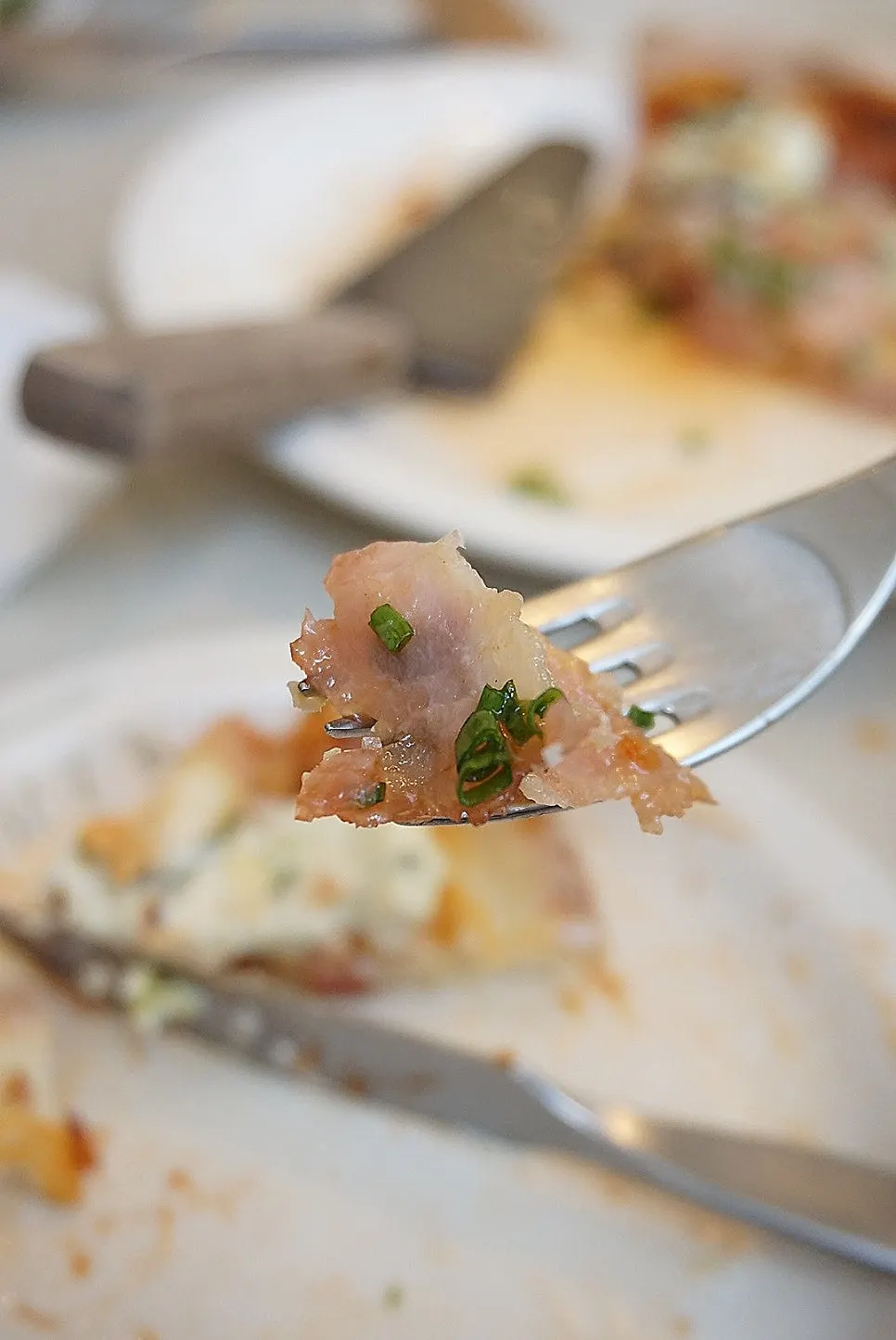 A pizza slice topped with jambon