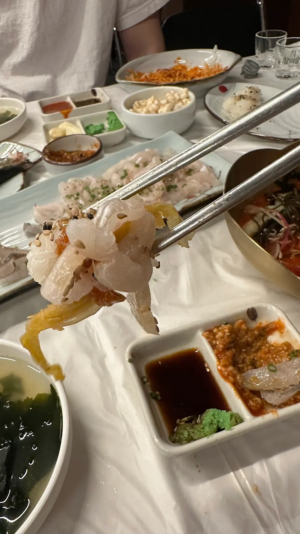 Live fish sashimi served with sushi rice
