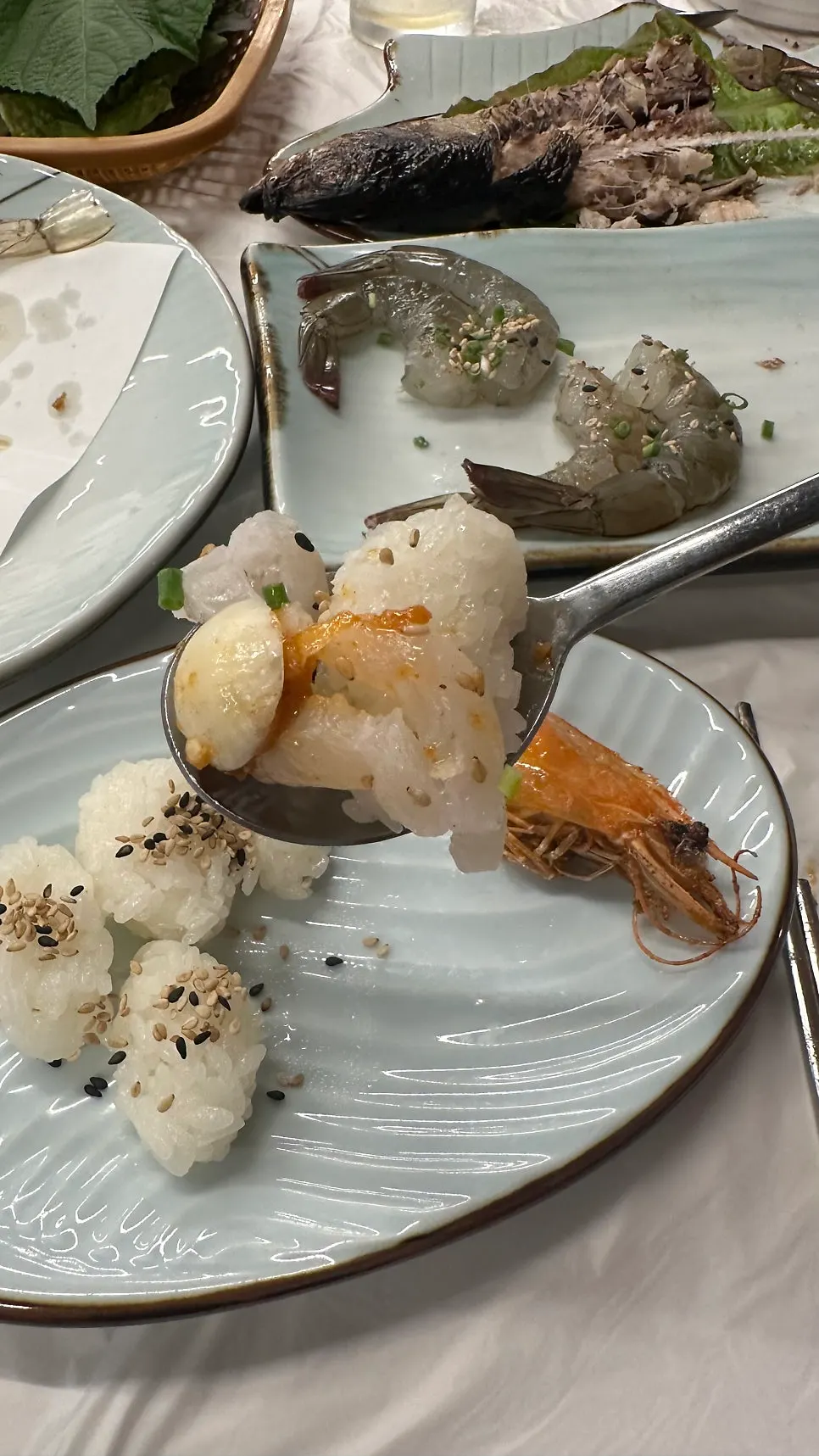 Live fish sashimi eaten with soy sauce