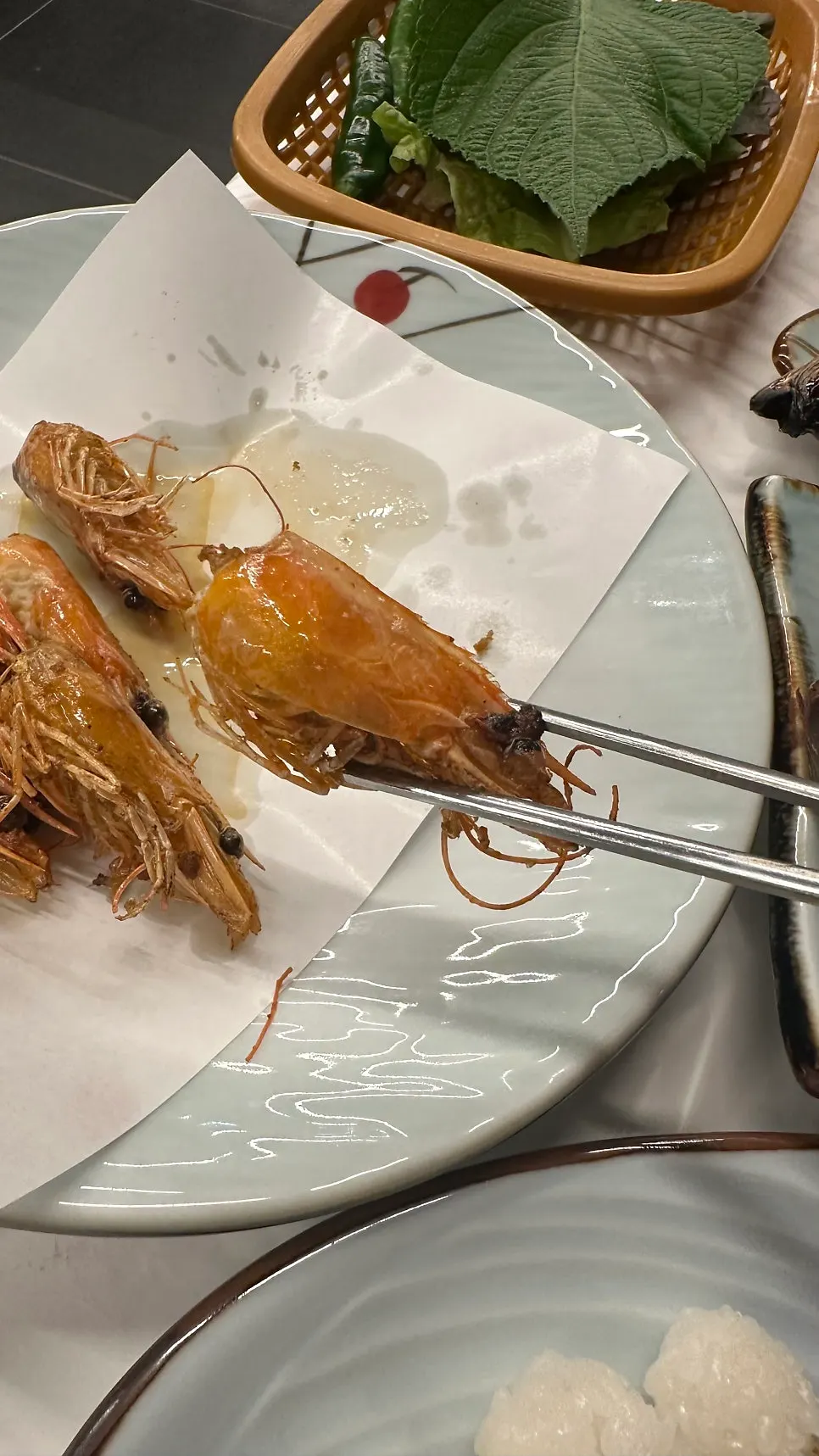 Savory grilled shrimp heads with butter