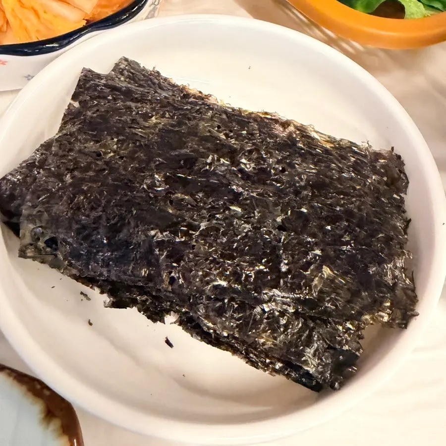 Grilled herring served on a cute plate