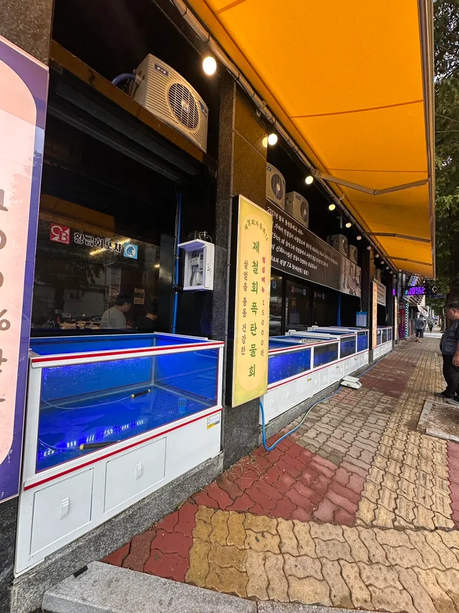 Live fish tank placed outside the restaurant
