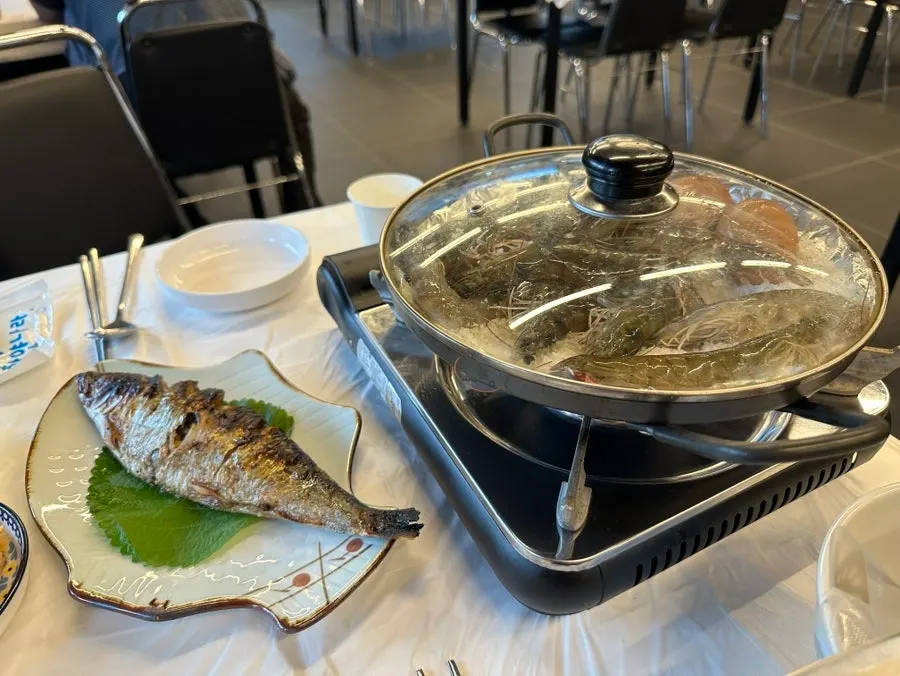 Basic table setting with seaweed soup and vinegar salad