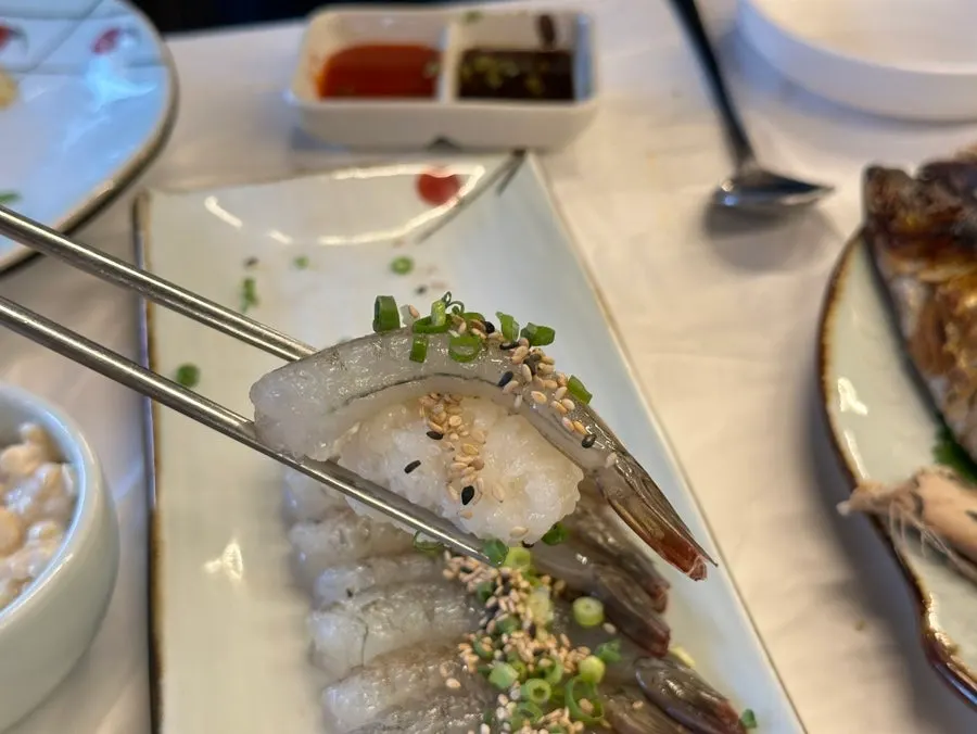 Plump raw shrimp sashimi with wasabi soy sauce