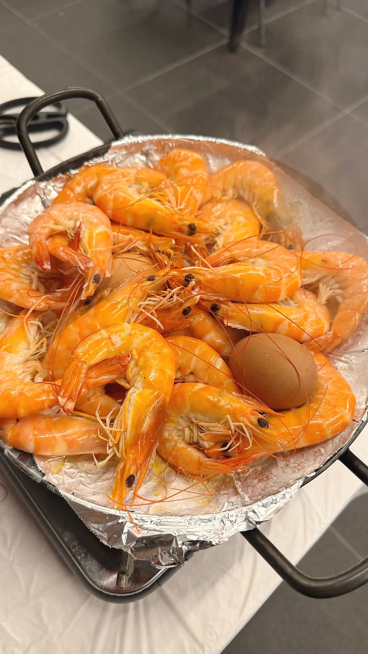 Salt-grilled shrimp turning orange as it cooks