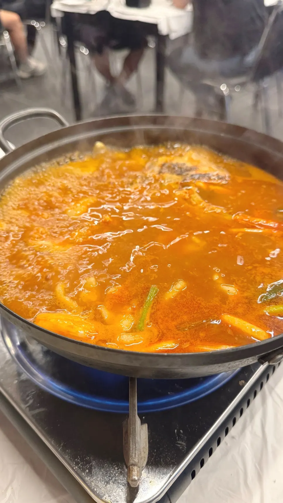 Spicy stew boiling with chewy dumpling dough