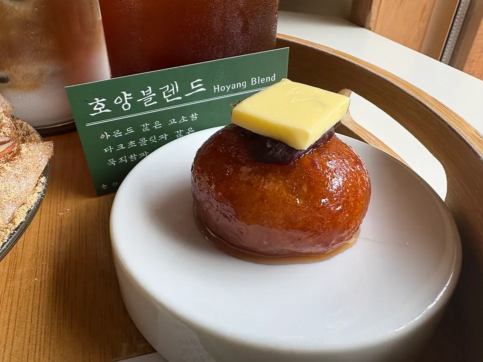Ang-butter gaeseongjuak with an iced americano