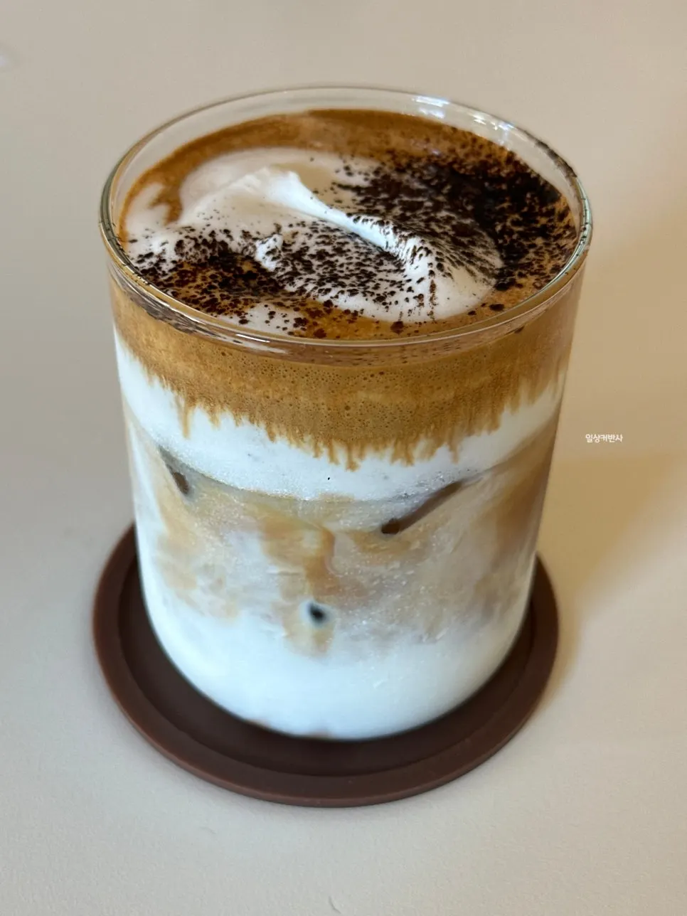 Vanilla bean cream latte topped with cream