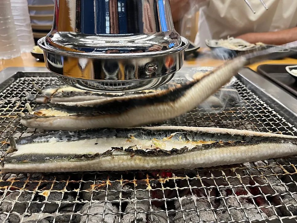 Charcoal and basic side dishes already set up at the table