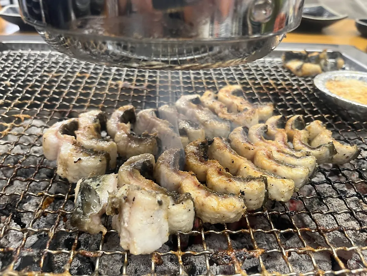 Tableside ordering screen showing how to grill the eel