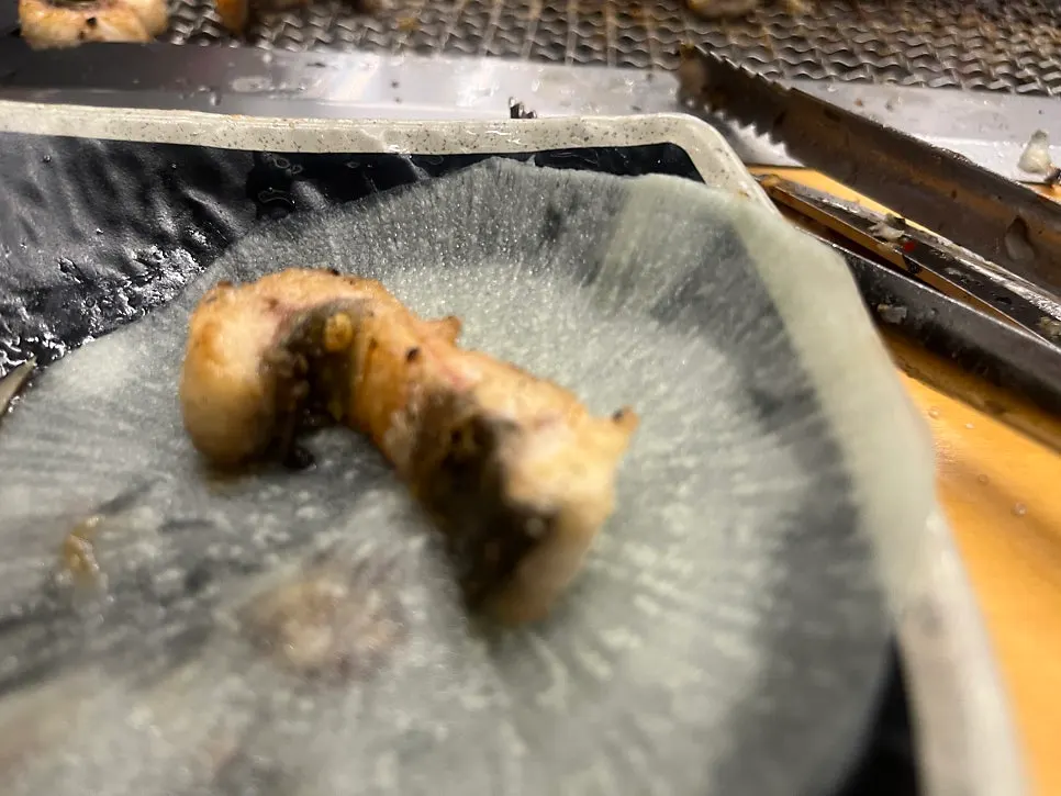 Grilled eel wrapped in vegetables