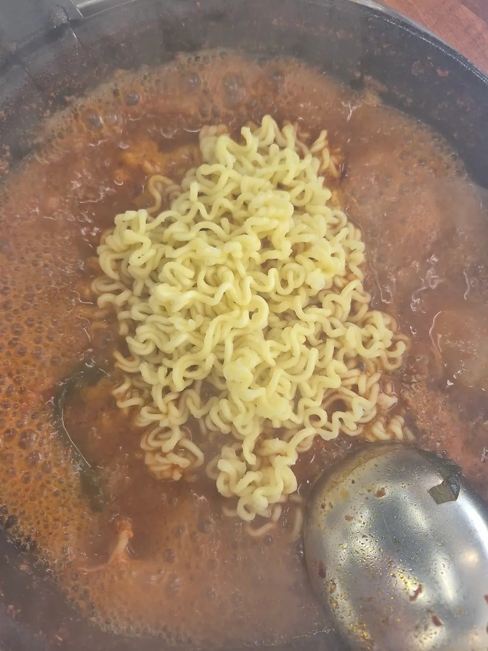 Gopchang hot pot reduced down after adding more broth