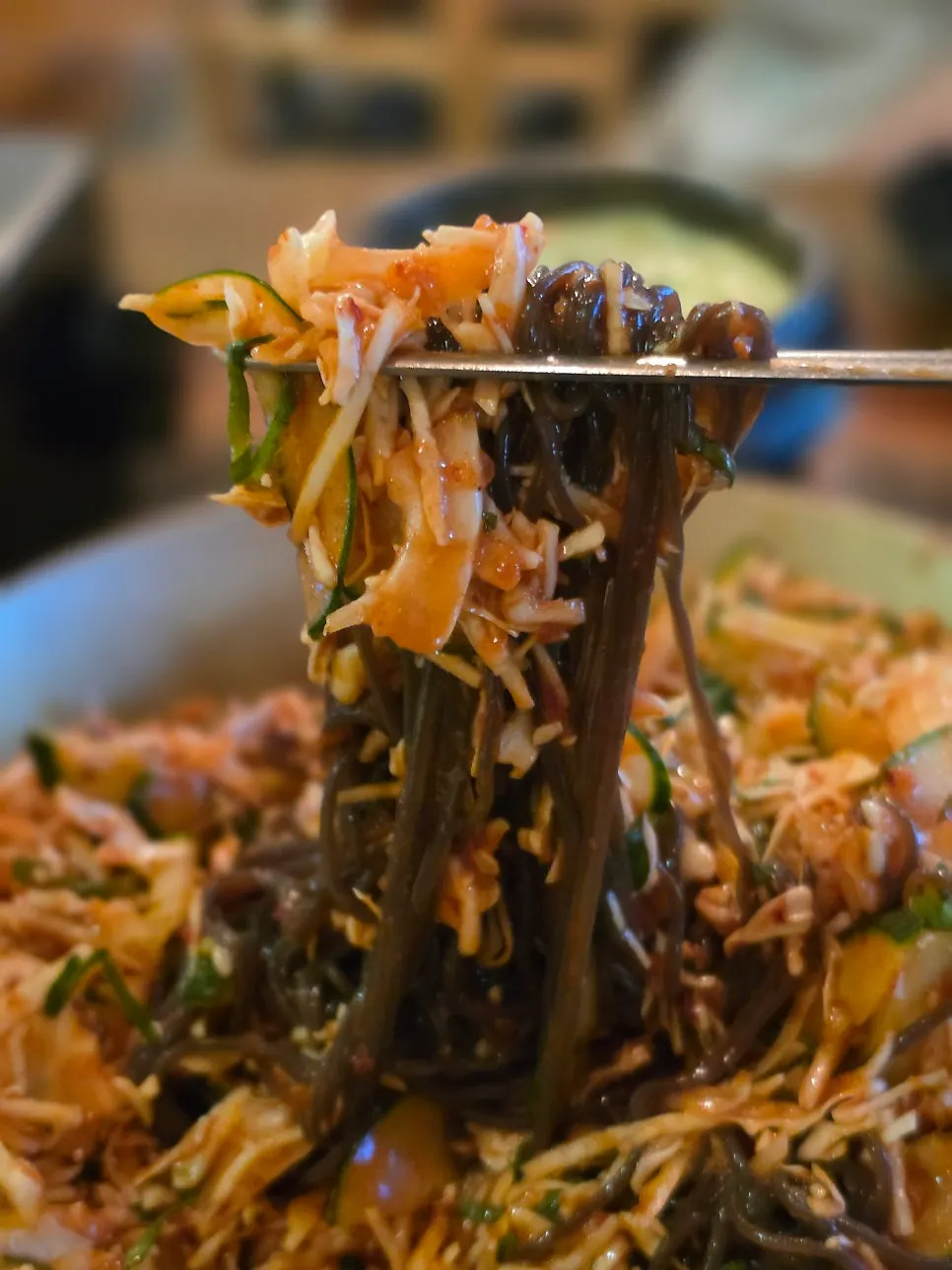 Sweet-and-tangy makguksu with cabbage and cucumber
