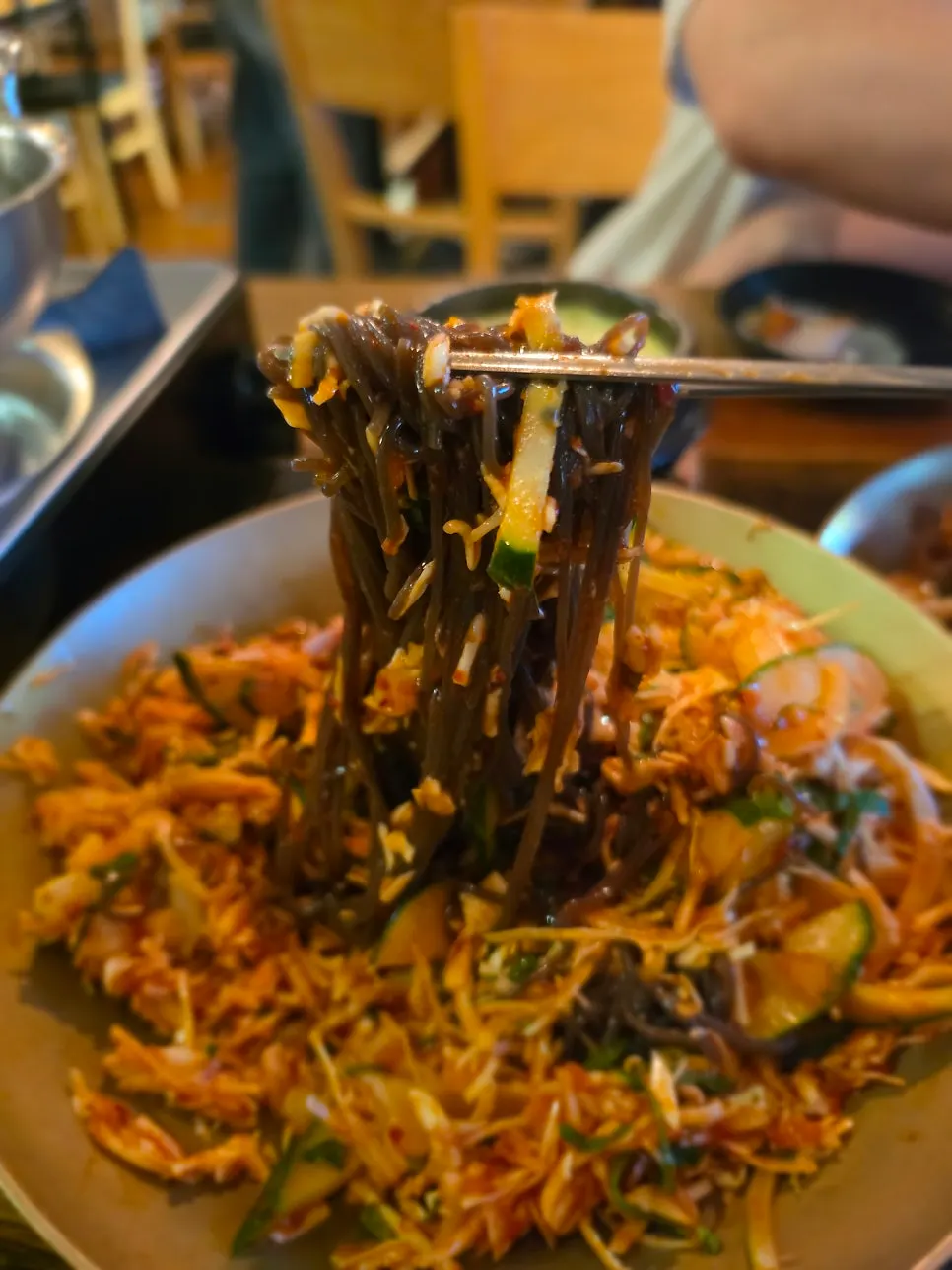 Close-up of makguksu noodles and vegetables
