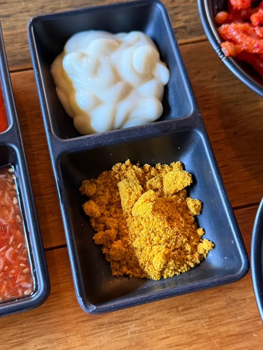 Curry sauce and white sauce ordered as add-ons