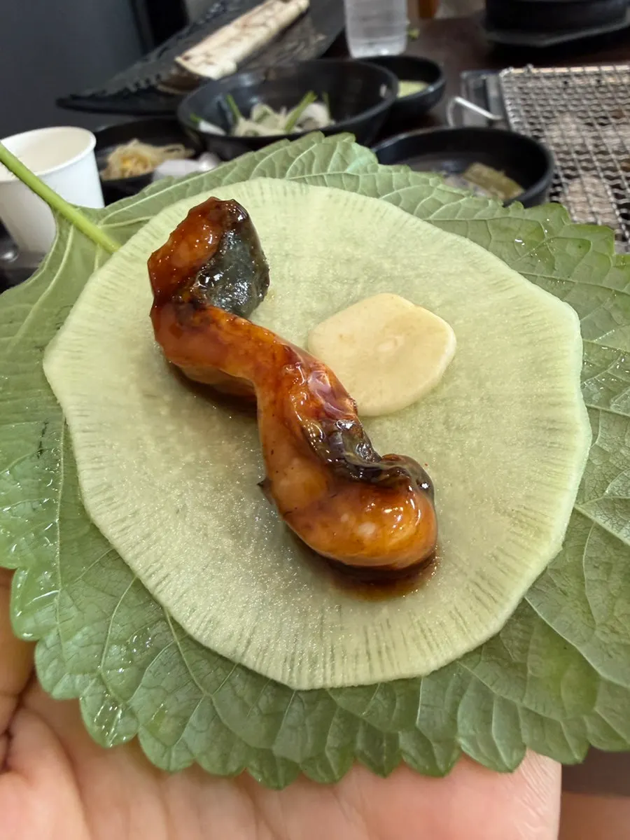 Broth and ingredients in the eel soup