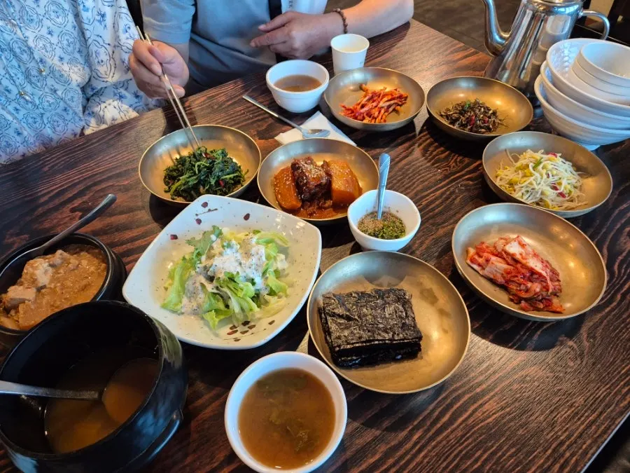 Table filled with side dishes in the gondeure set menu