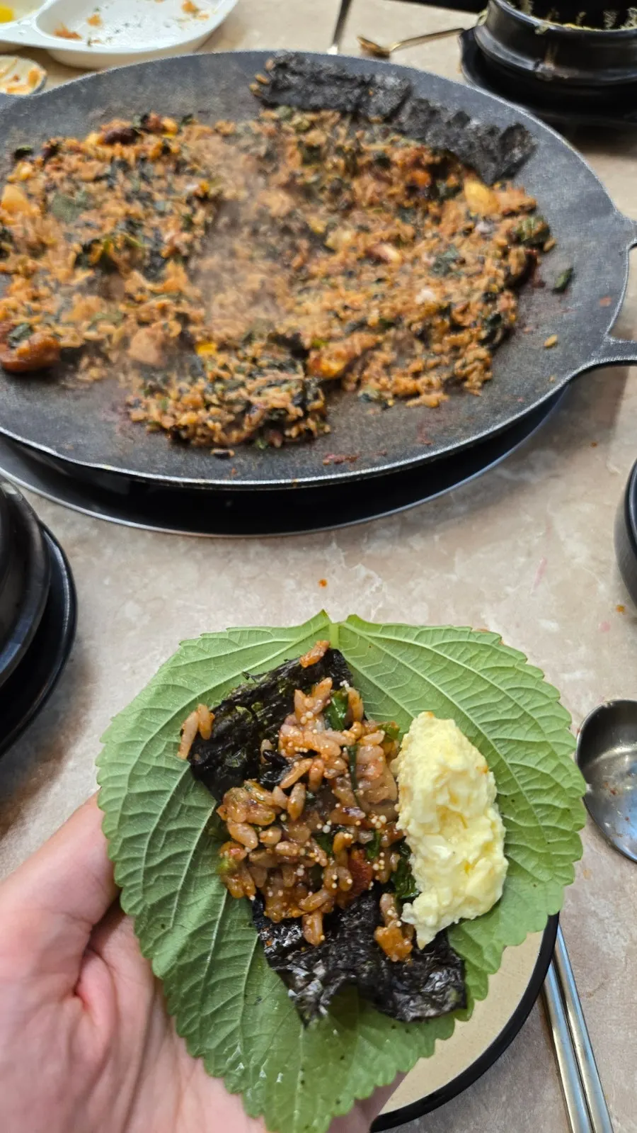 Fried rice and steamed egg wrapped in seaweed