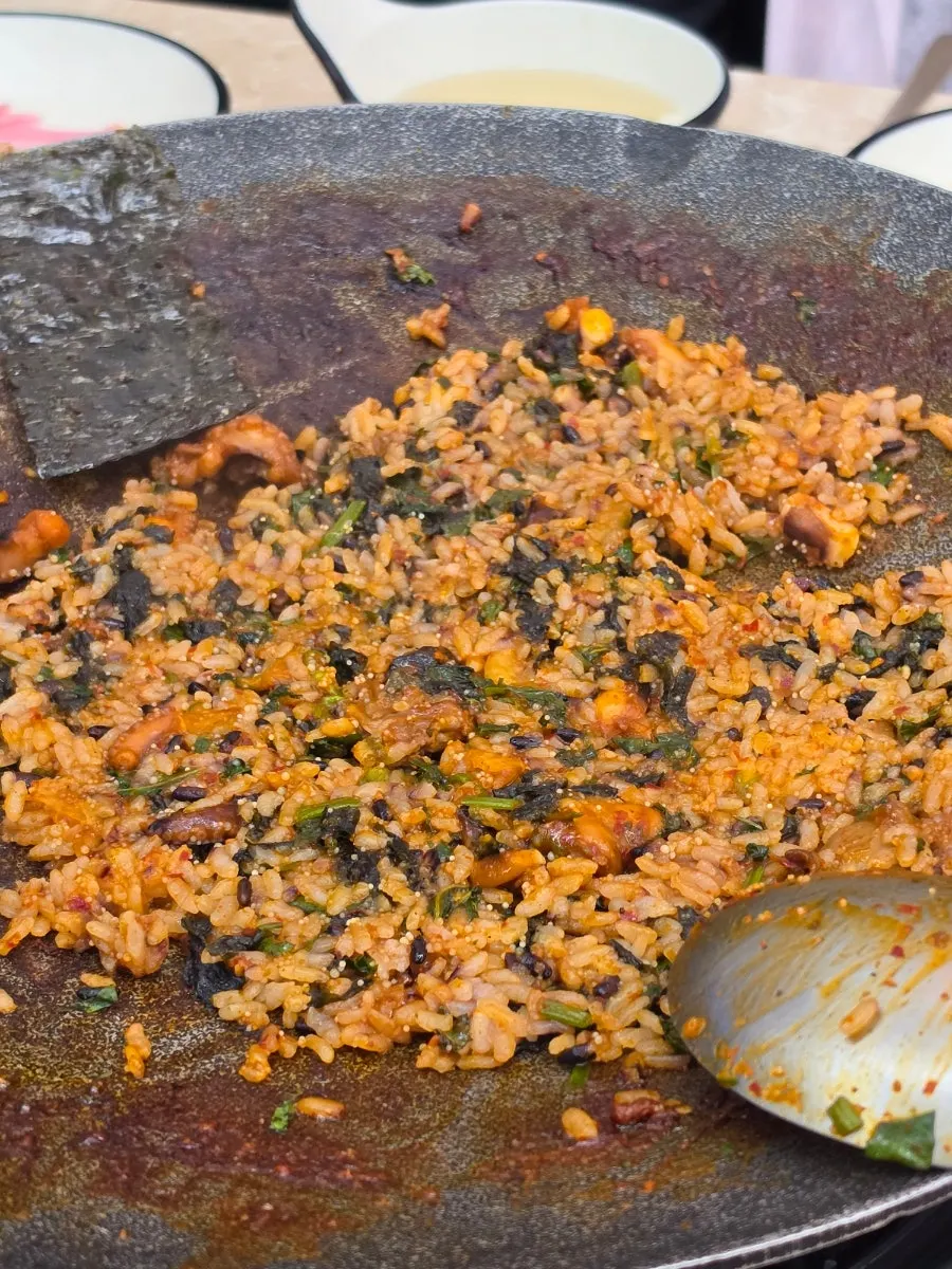 Flying fish roe fried rice cooking on the griddle