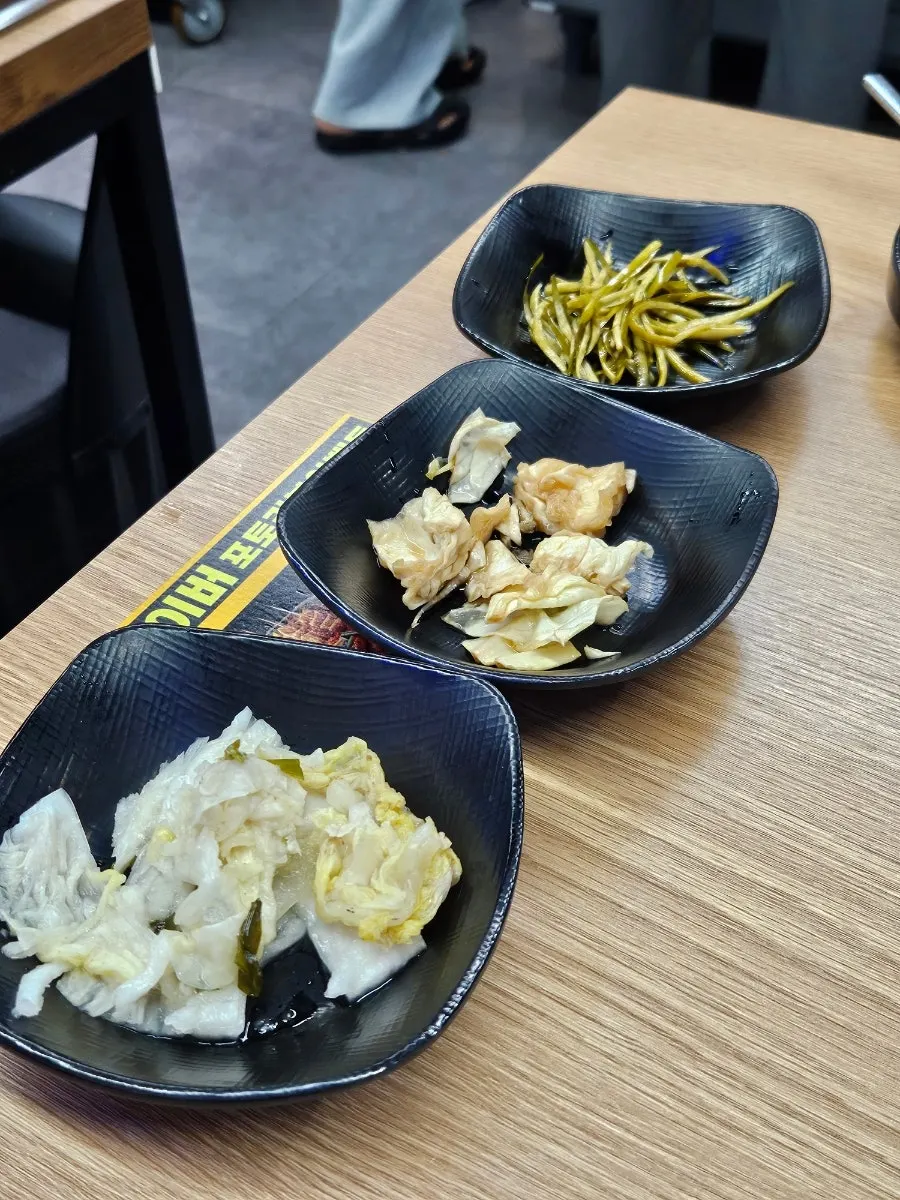 Chicken stew cooking on a pot lid