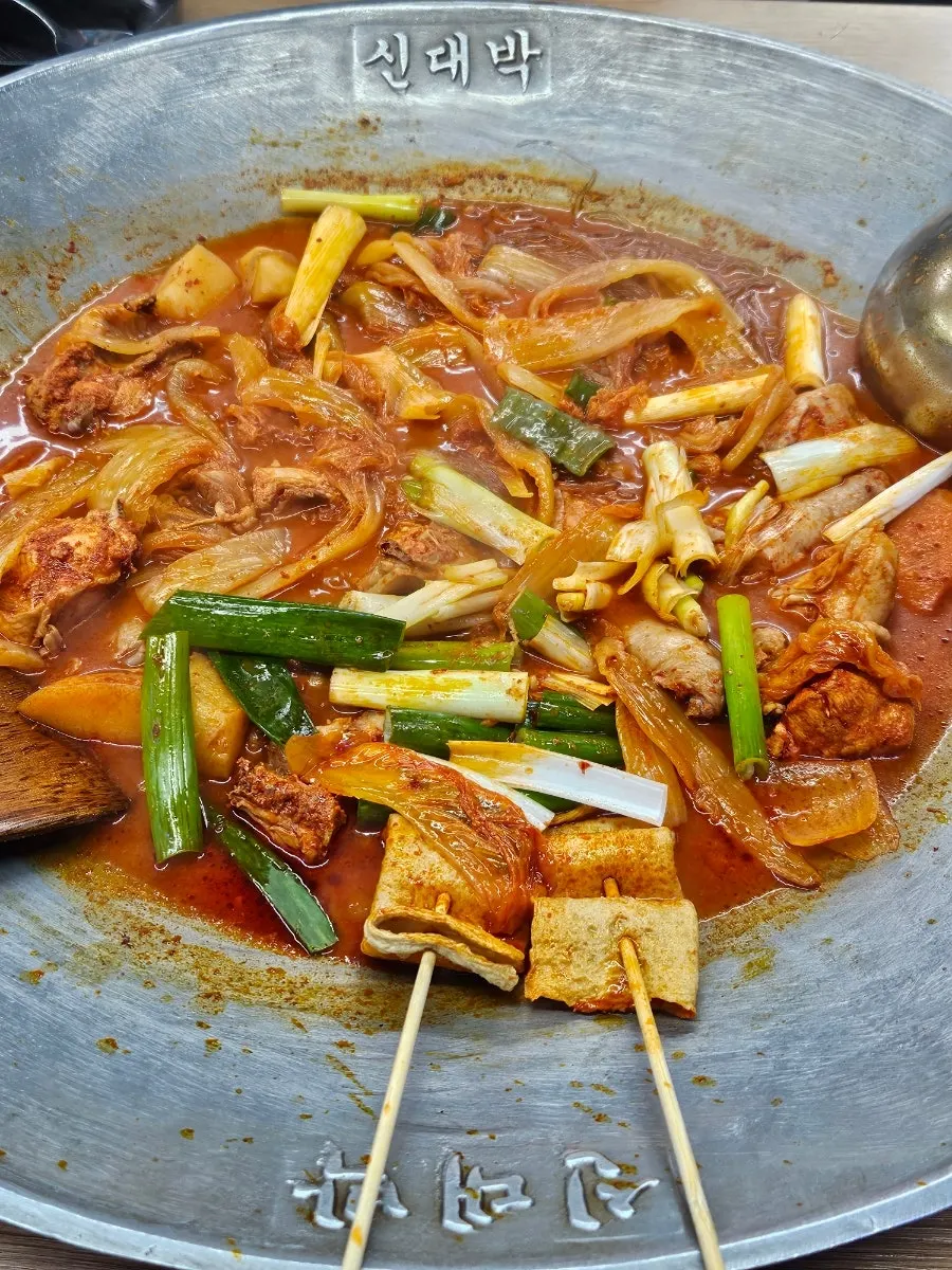 Chicken stew meal with rice and aged kimchi