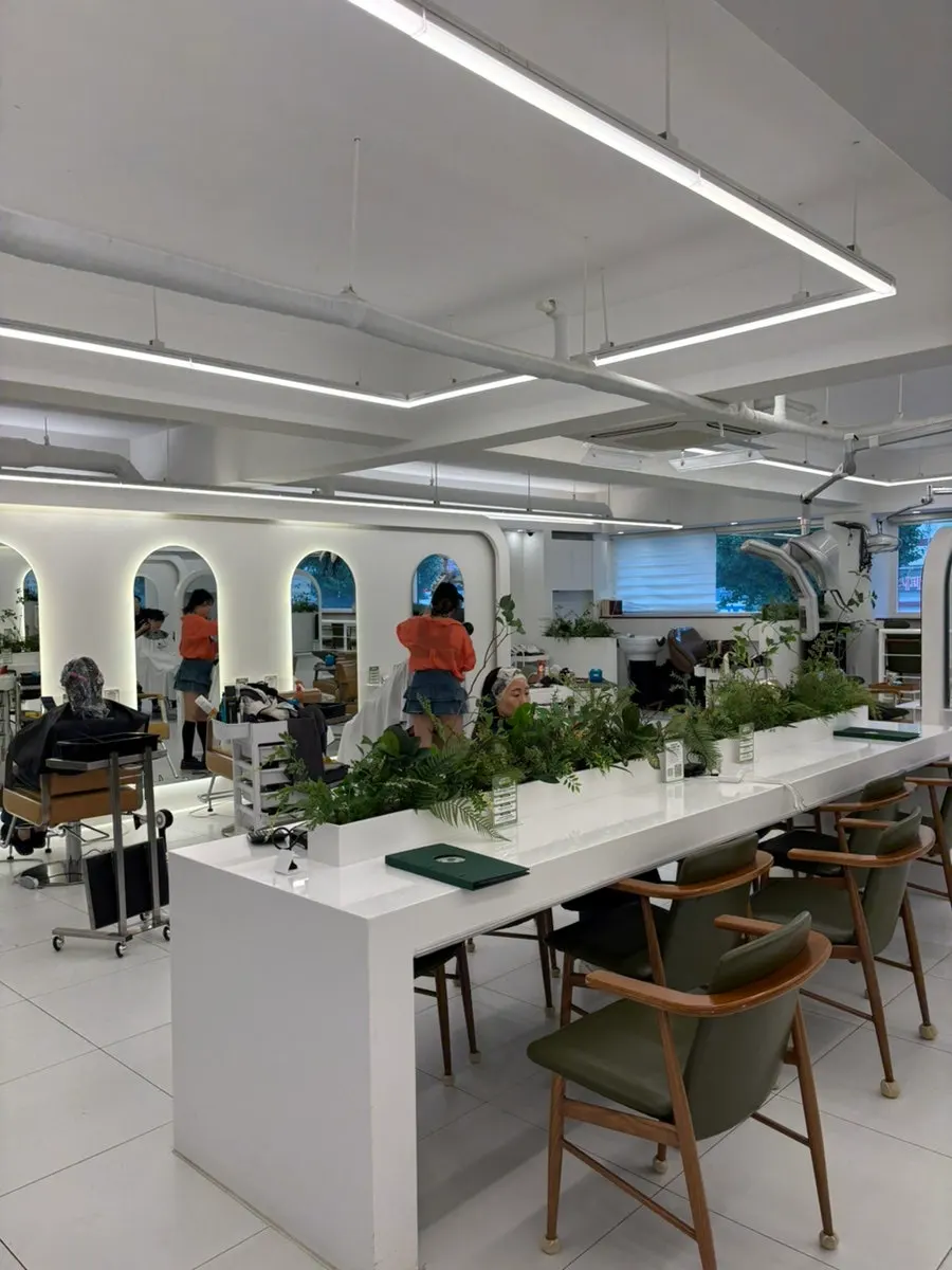 Salon interior with a botanical garden feel