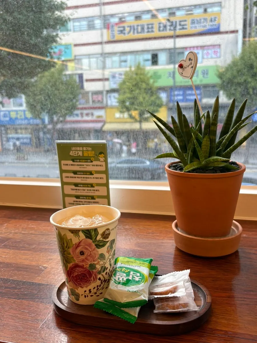 Apple juice served in a paper cup