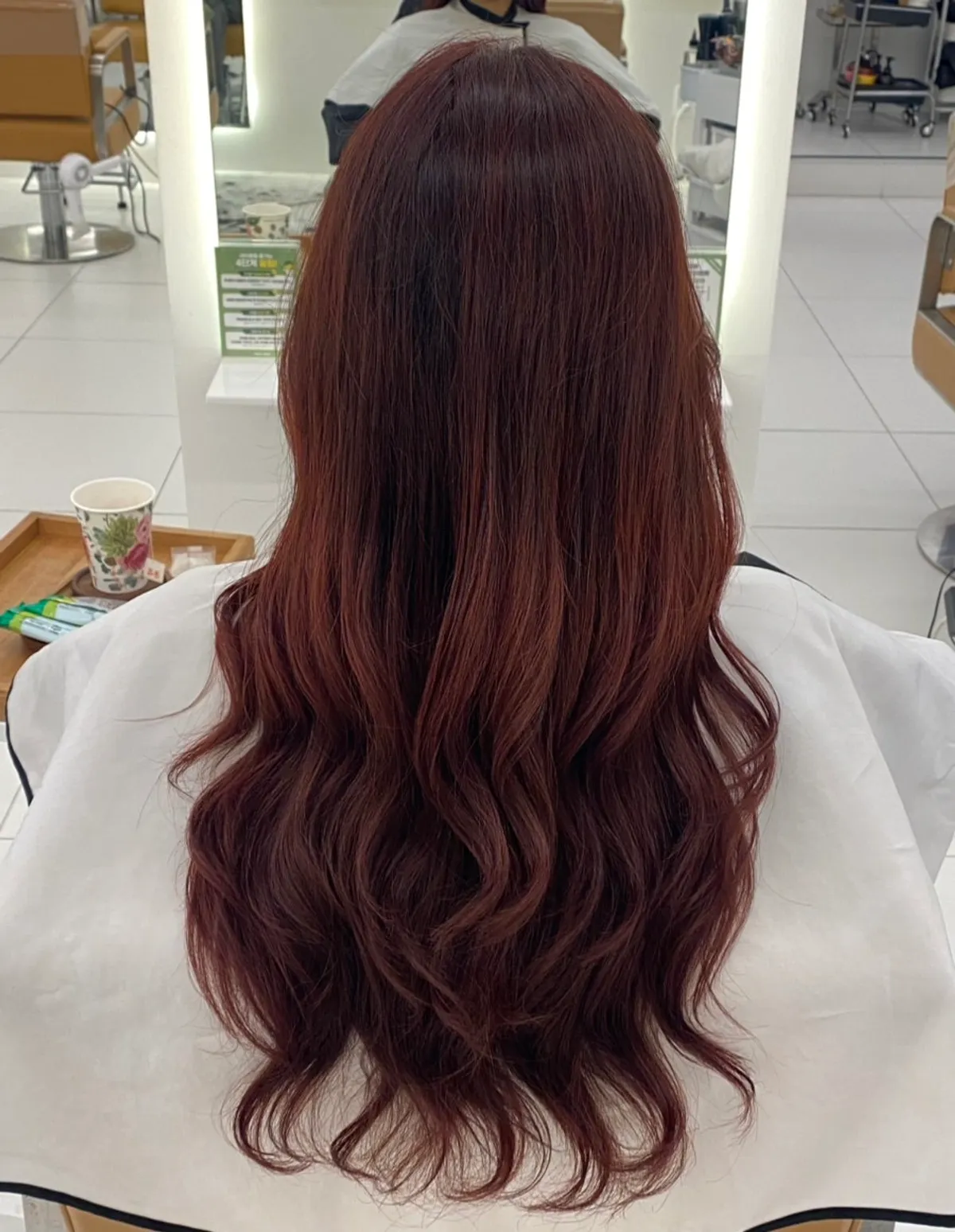 Finished red-brown dye and curling iron styling