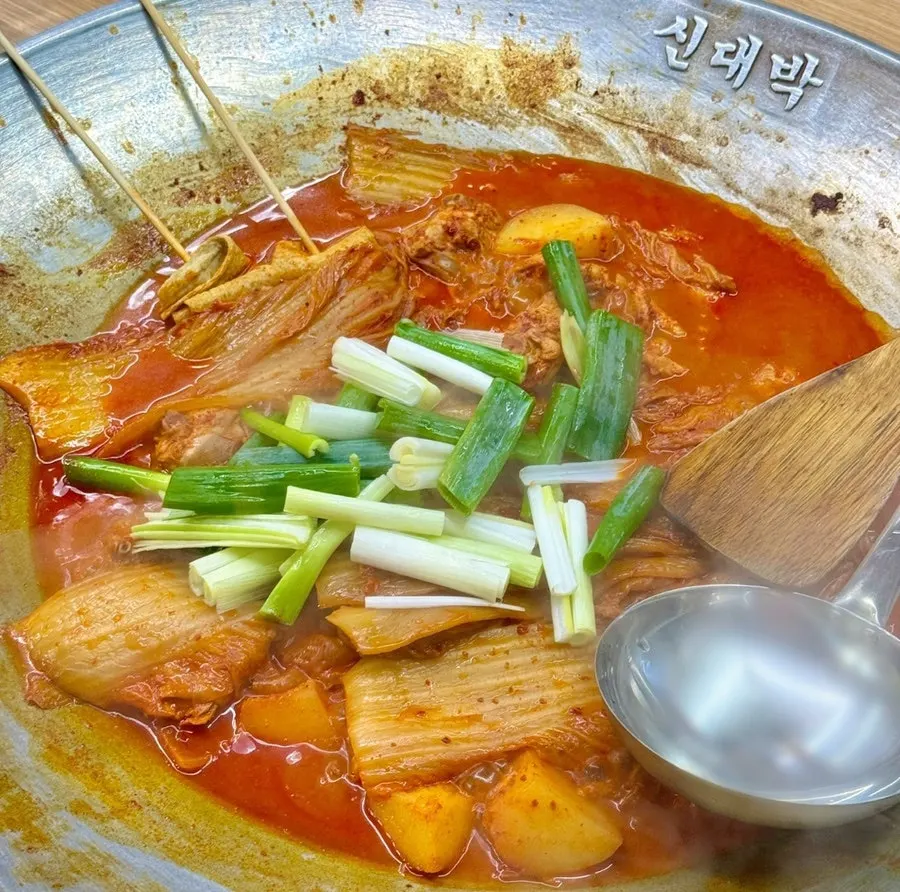 Aged-kimchi cast-iron chicken stew served in the pot