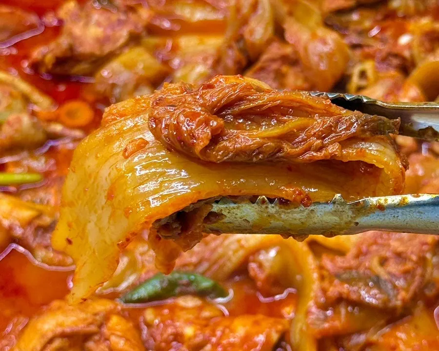 Sliced aged kimchi paired with the chicken stew