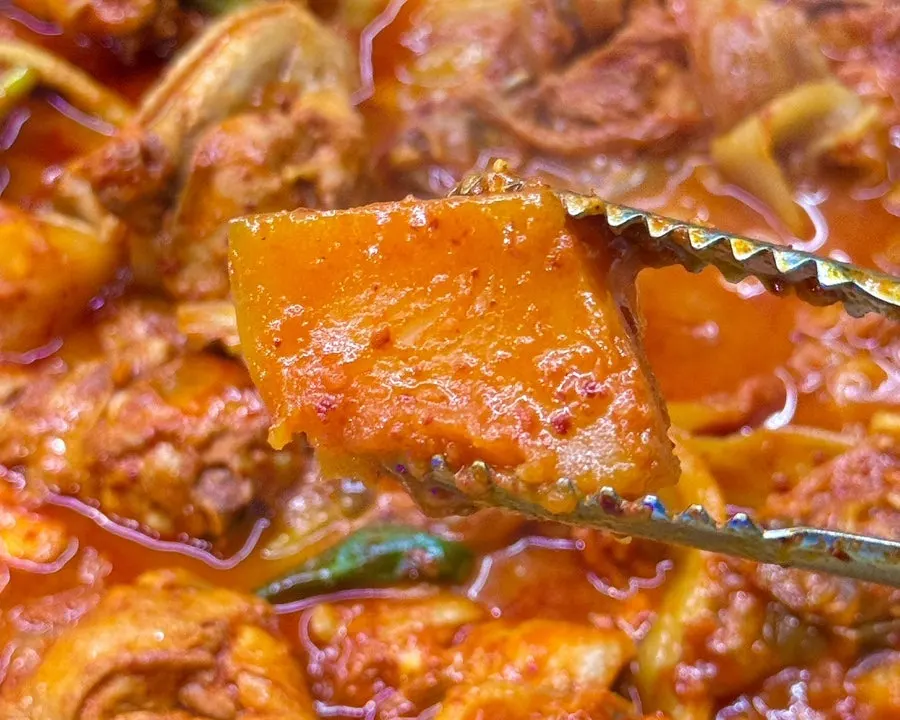 Fluffy cooked potatoes in the chicken stew