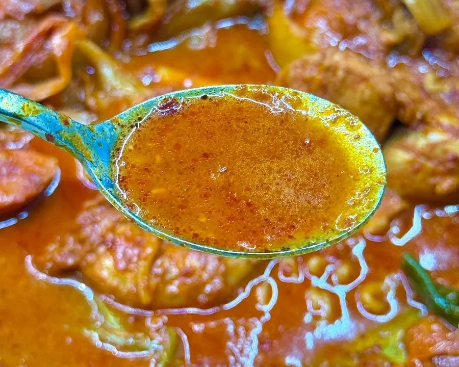 Richly reduced broth in the chicken stew pot