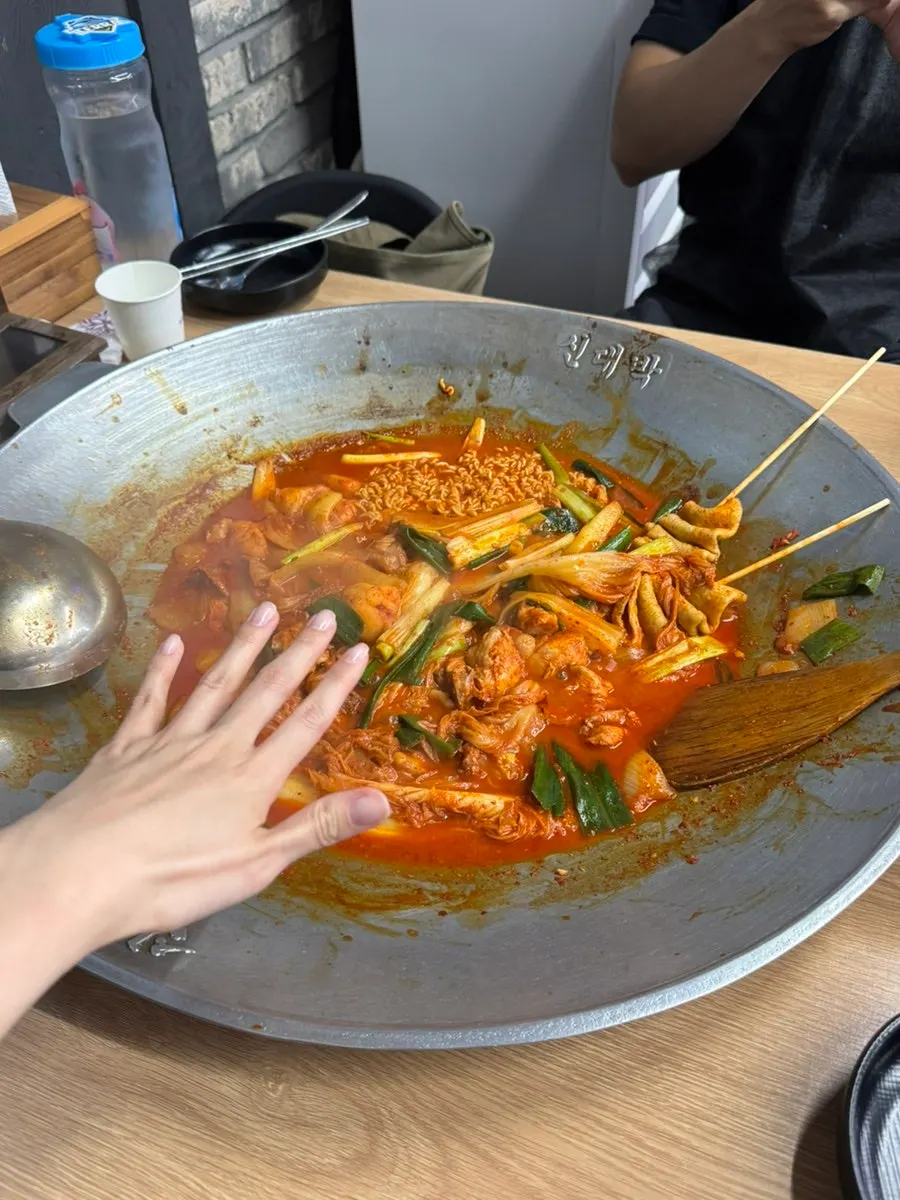 Chicken stew with ramyeon noodles soaked in sauce